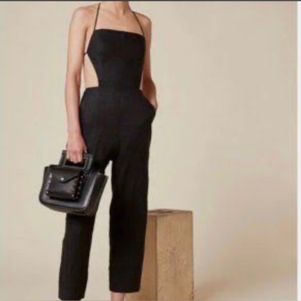Black reformation pant suit with lace up back
